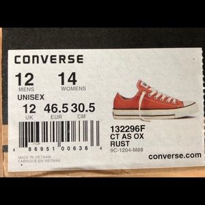 Unisex low top rust/orange color. Converse shoe.